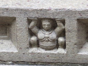 Figure on hard work in the Temple of the Tooth